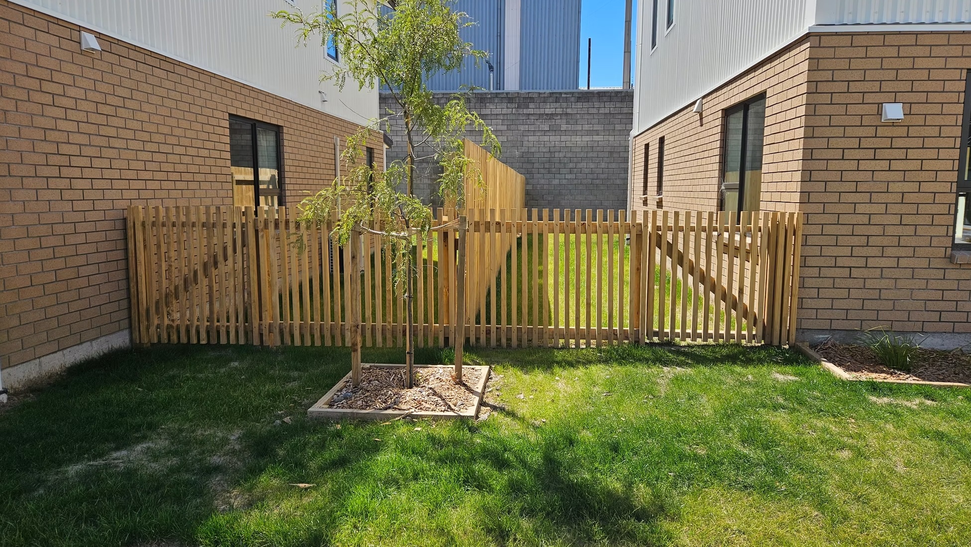 Modern wooden fence installation